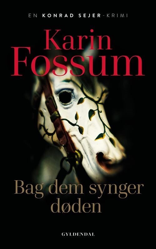 BAG DEM SYNGER DØDEN